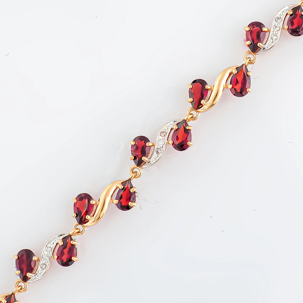 Браслет с гранатом из красного золота 585 пробы