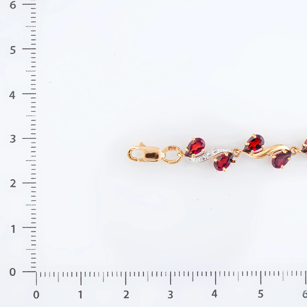Браслет с гранатом из красного золота 585 пробы