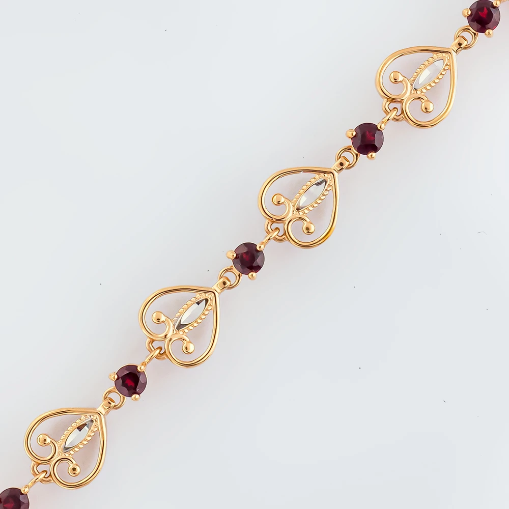 Браслет с гранатом из красного золота 585 пробы