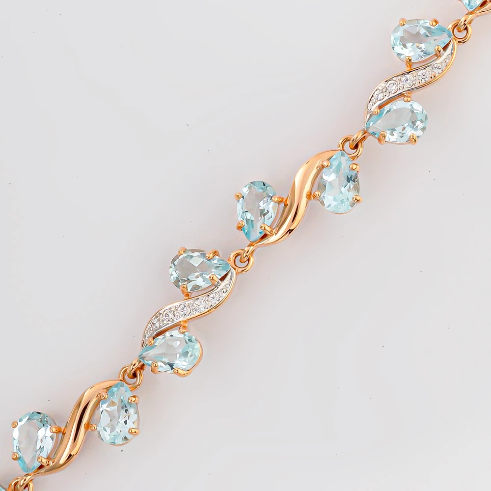 Браслет с топазом из красного золота 585 пробы