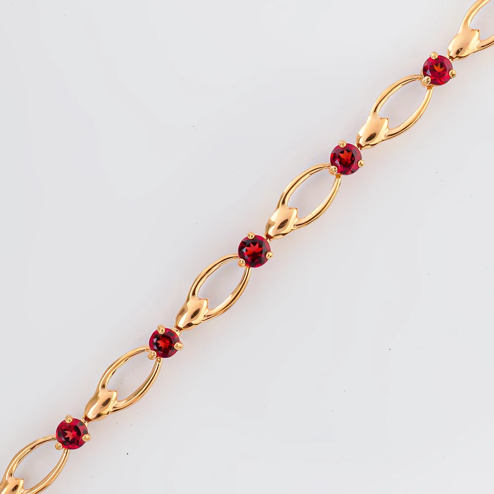 Браслет с гранатом из красного золота 585 пробы