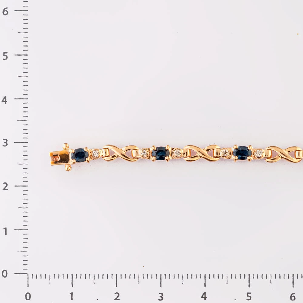 Браслет с сапфиром из красного золота 585 пробы