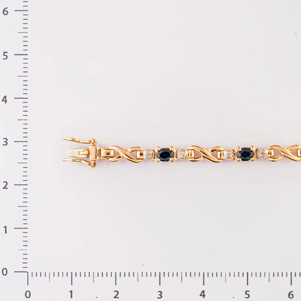 Браслет с сапфиром из красного золота 585 пробы