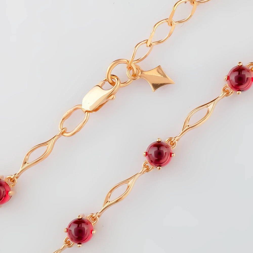 Браслет с гранатом из красного золота 585 пробы