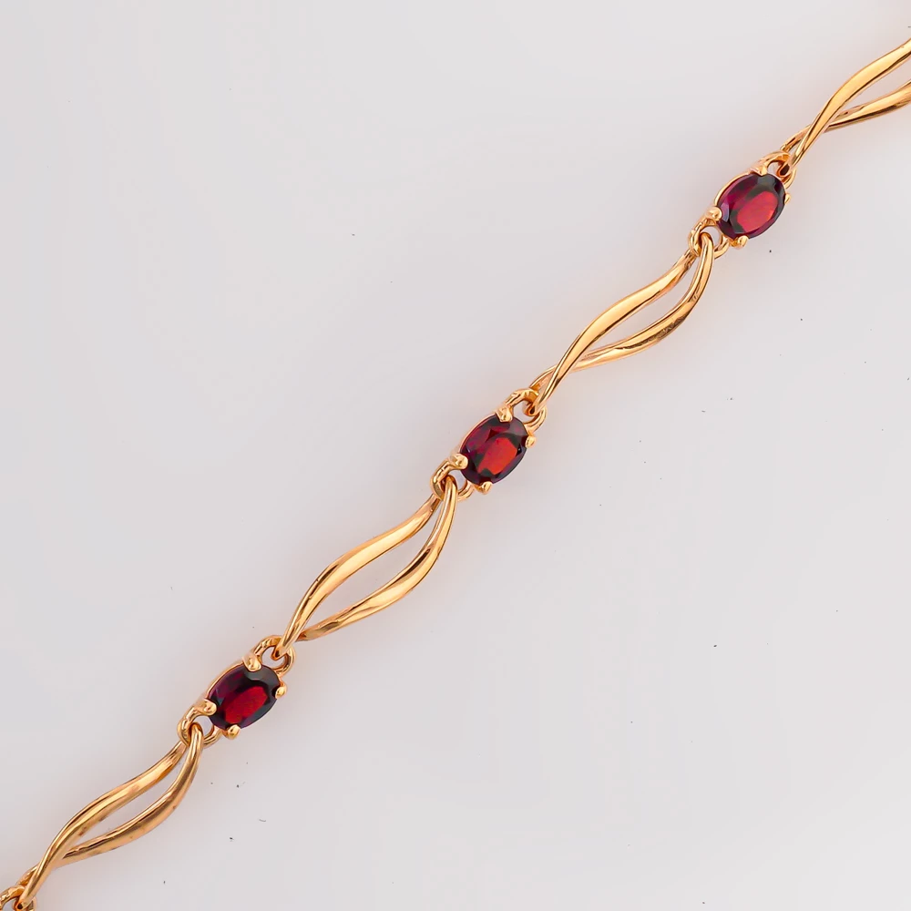 Браслет с гранатом из красного золота 585 пробы