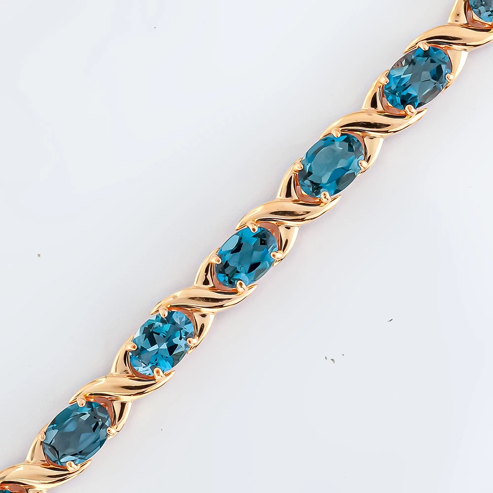 Браслет с топазом лондон из красного золота 585 пробы