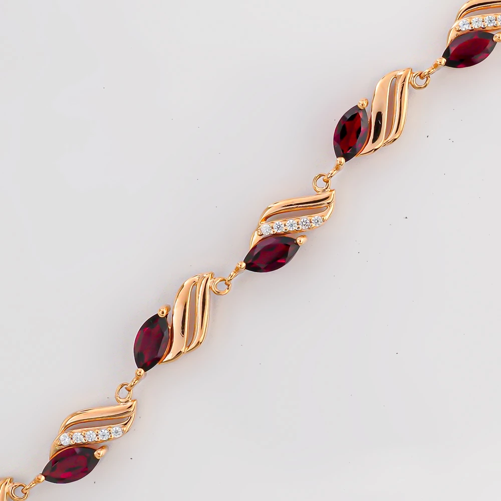 Браслет с гранатом из красного золота 585 пробы