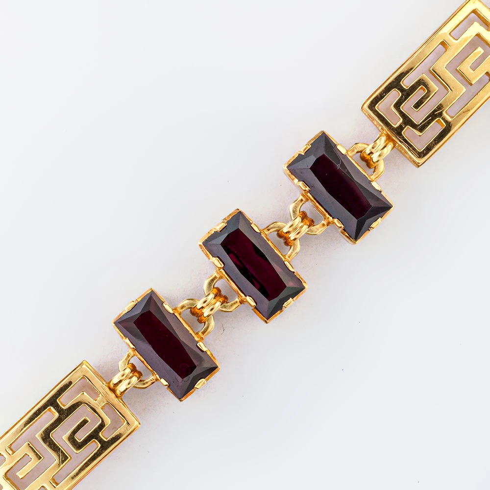 Браслет с гранатом из желтого золота 585 пробы