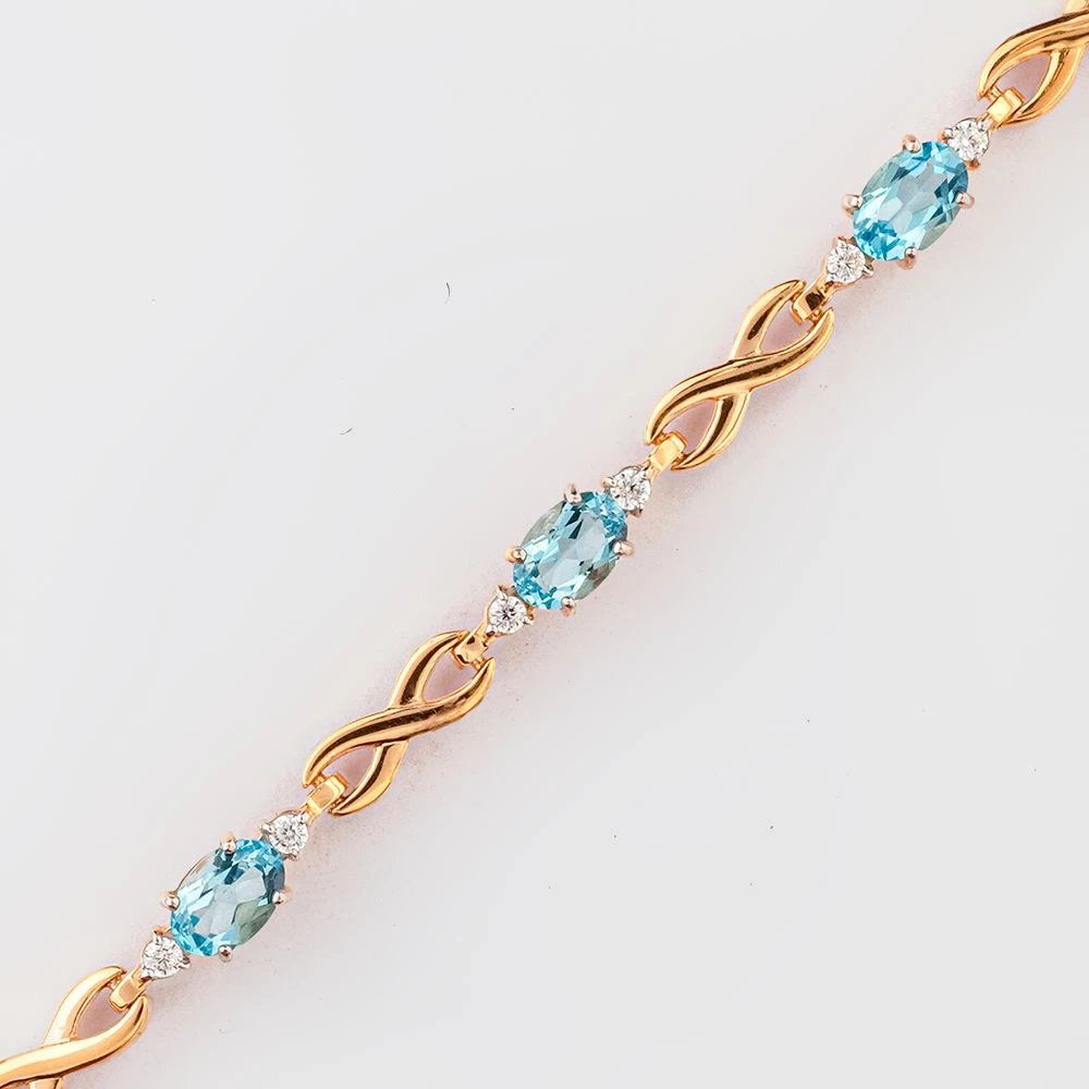 Браслет с топазом из красного золота 585 пробы