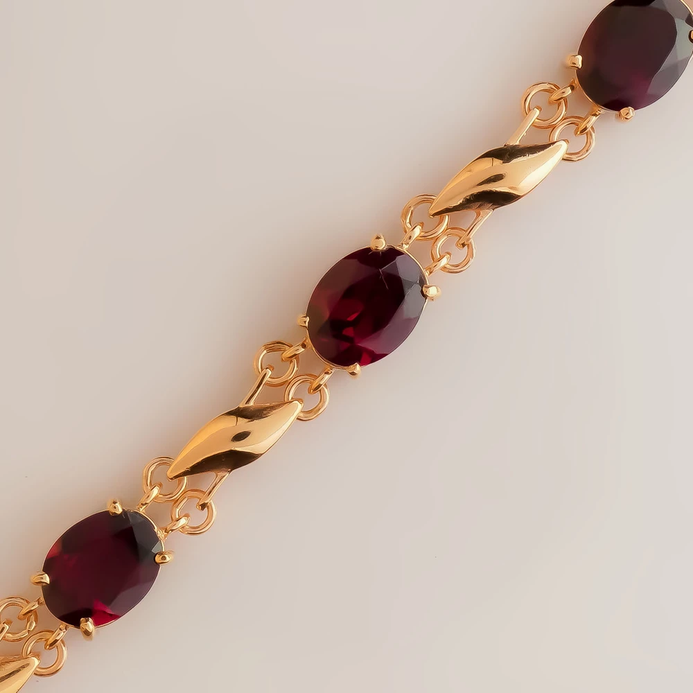 Браслет с гранатом из красного золота 585 пробы