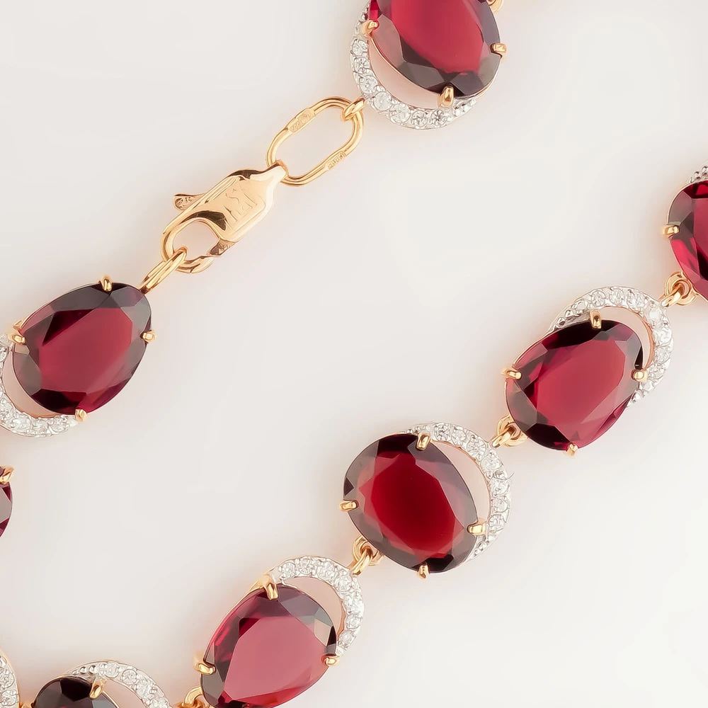 Браслет с гранатом из красного золота 585 пробы