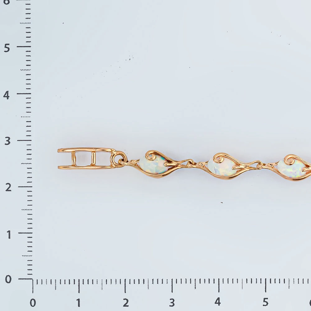 Браслет с опалом синтетическим из красного золота 585 пробы