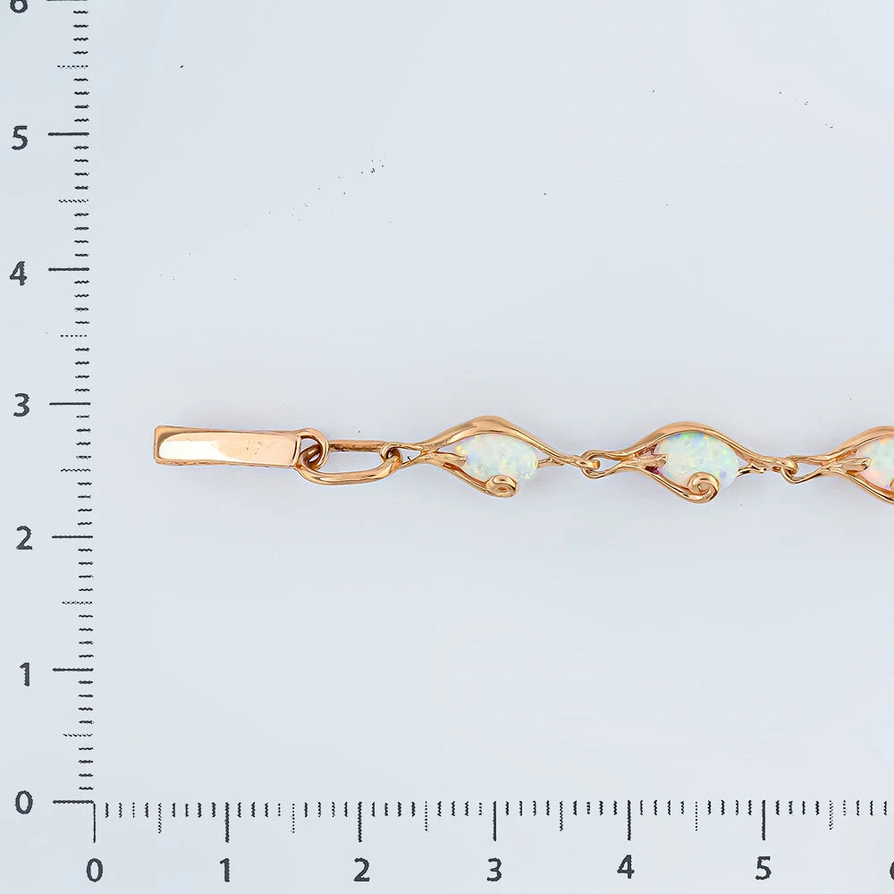 Браслет с опалом синтетическим из красного золота 585 пробы