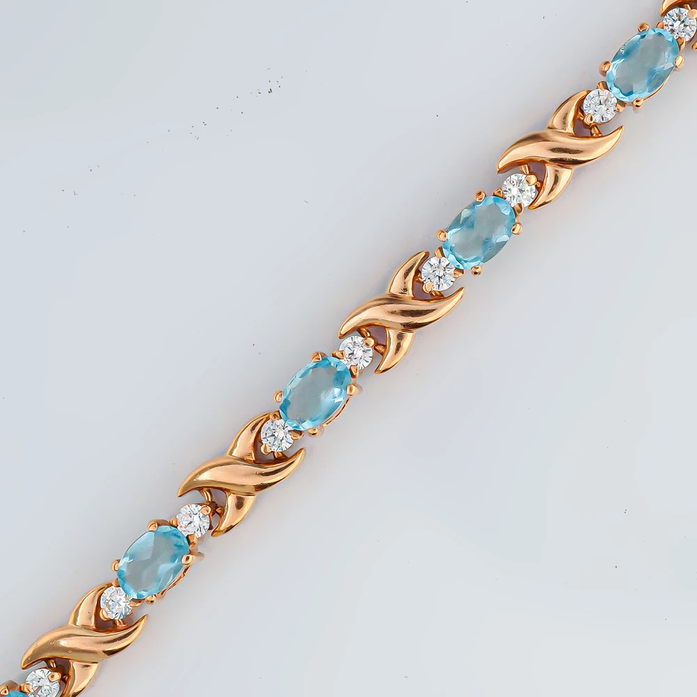 Браслет с топазом из красного золота 585 пробы