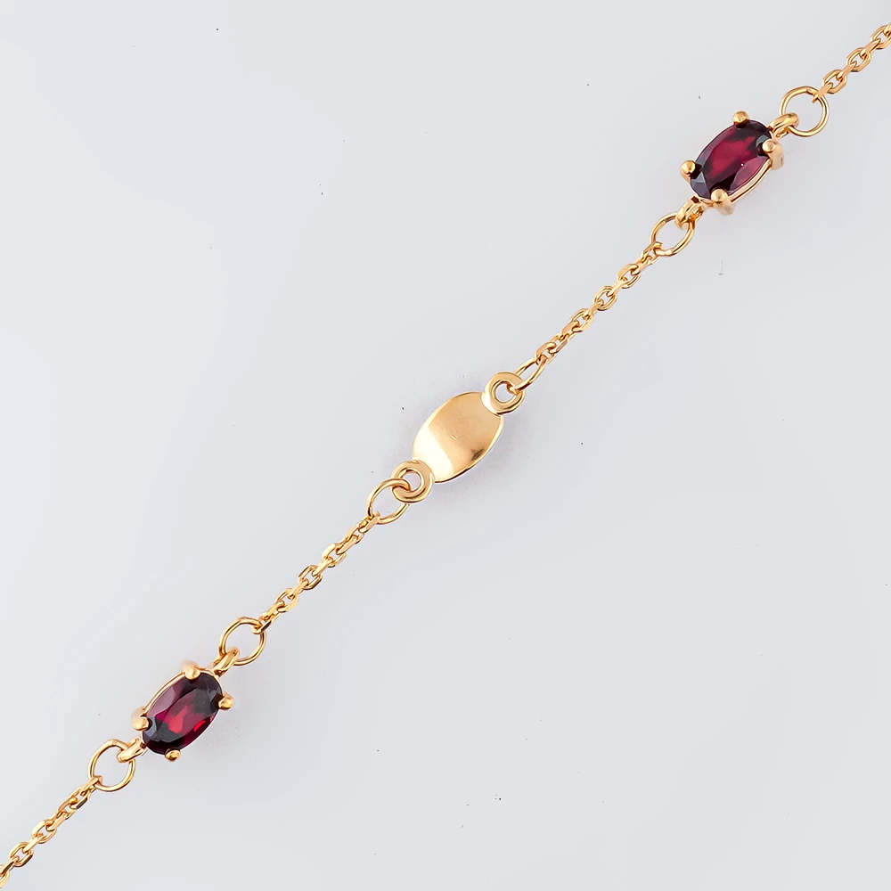 Браслет с гранатом из красного золота 585 пробы