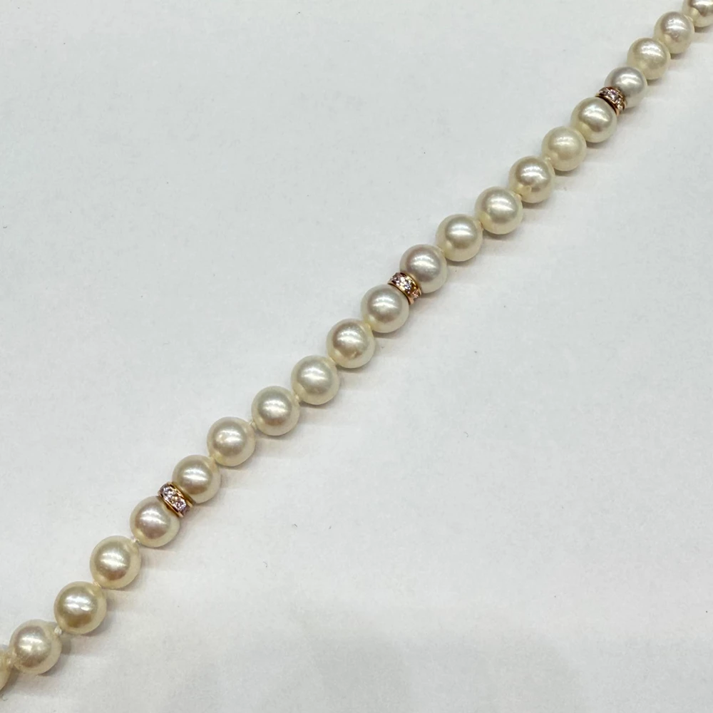 Браслет с культивированным жемчугом из красного золота 585 пробы