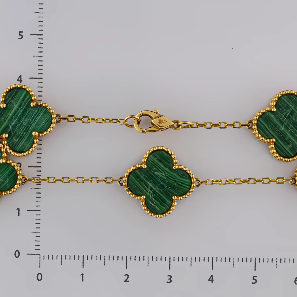 Браслет с малахитом из желтого золота 585 пробы