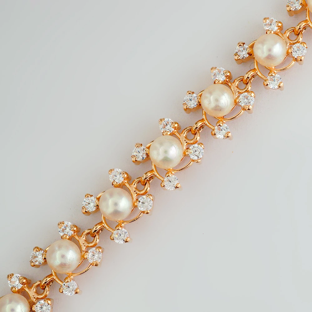 Браслет с культивированным жемчугом из красного золота 585 пробы