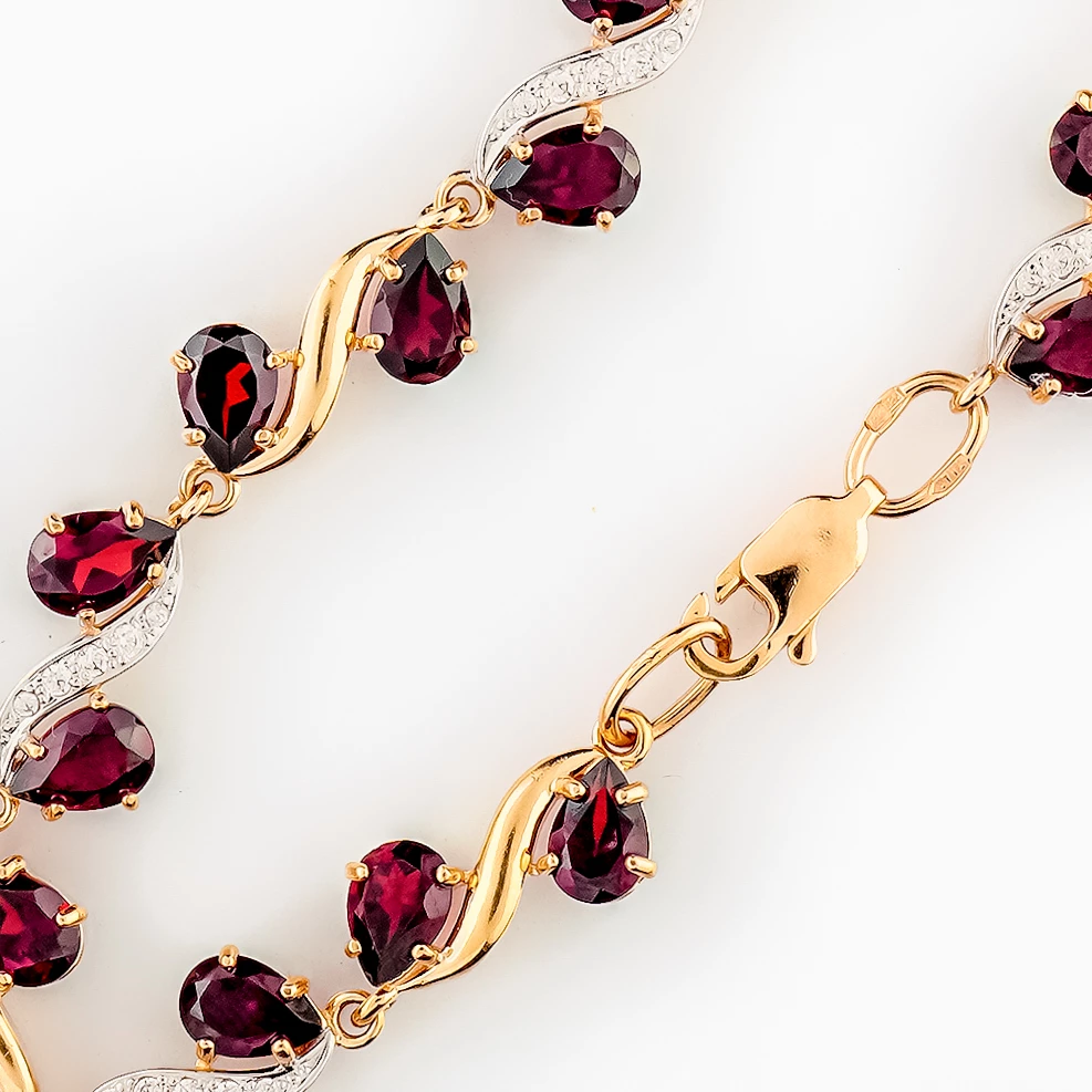 Браслет с гранатом из красного золота 585 пробы