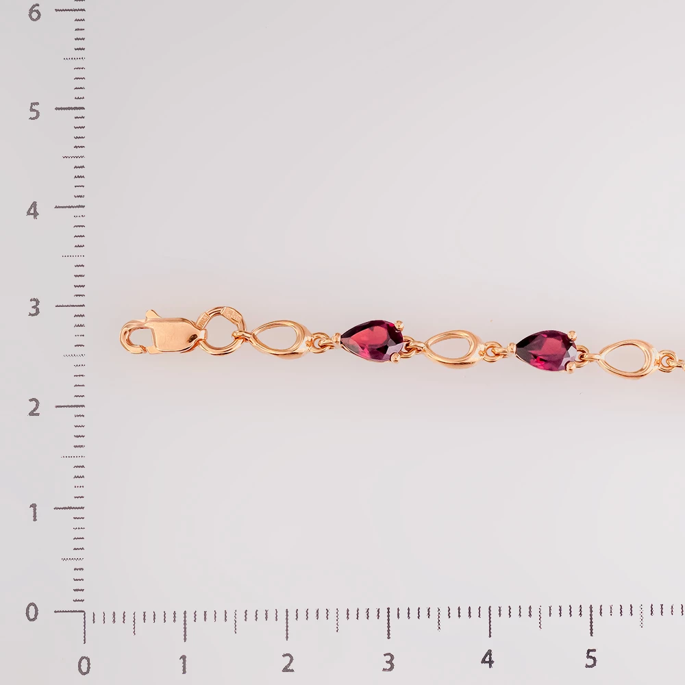 Браслет с гранатом из красного золота 585 пробы