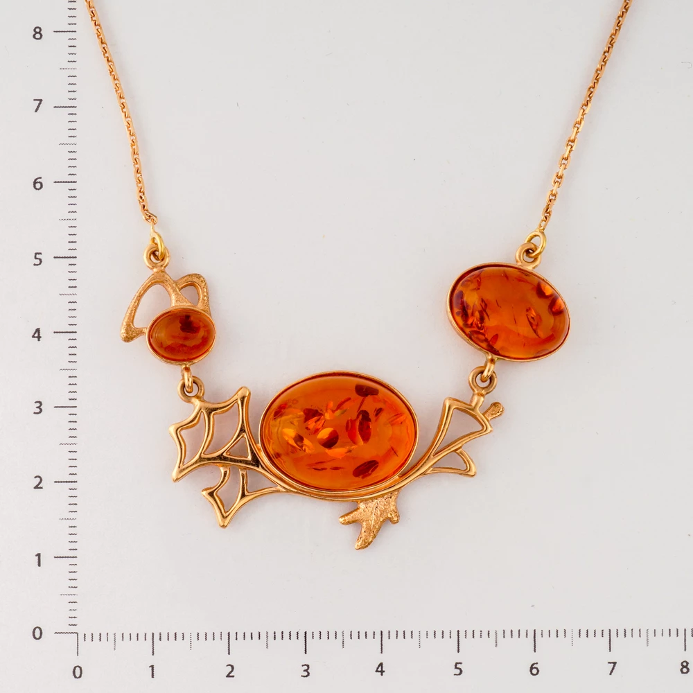 Колье с янтарем из красного золота 585 пробы