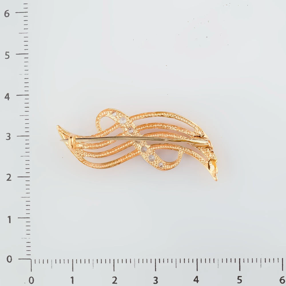 Брошь с фианитом из красного золота 585 пробы