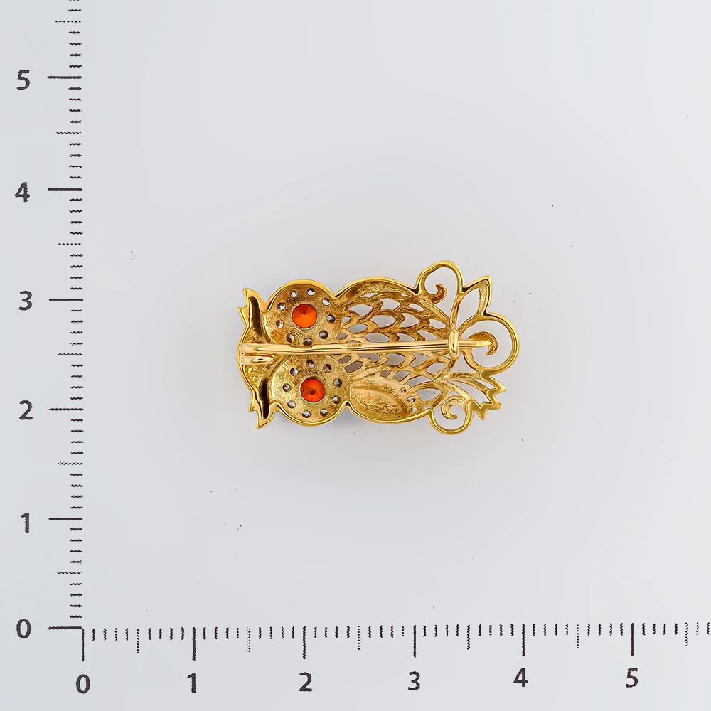 Брошь с фианитом из красного золота 585 пробы