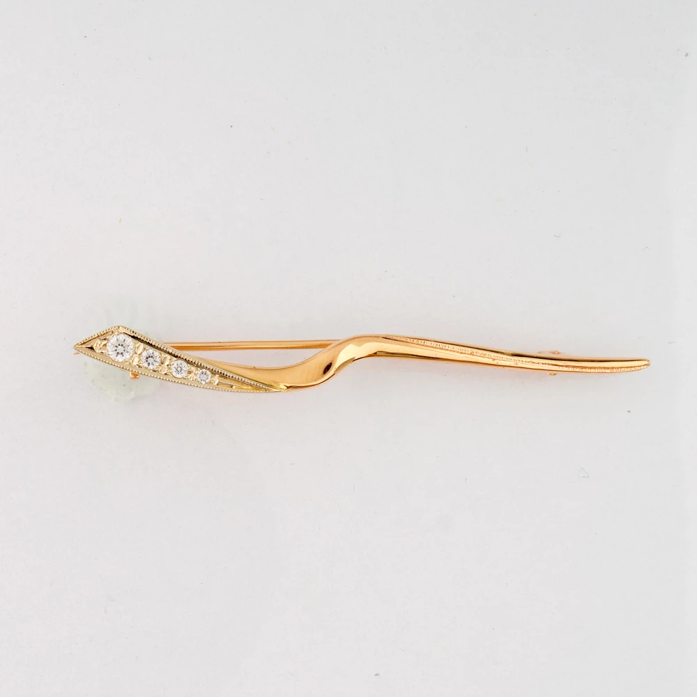 Брошь с фианитом из красного золота 585 пробы